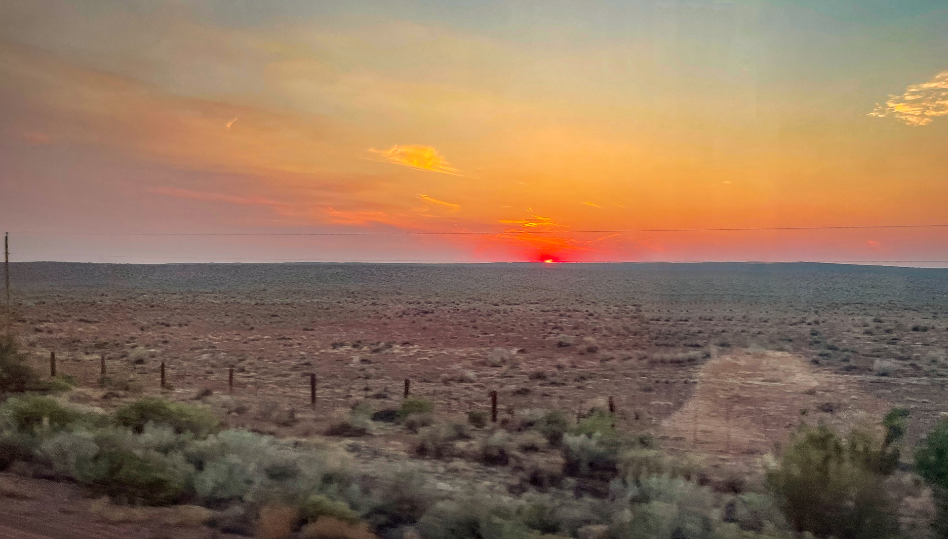 riding Amtrak allows you to watch the sun rise over the Petrified Forest National Park