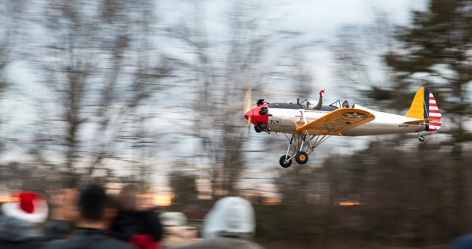 Santa in a classic warplane