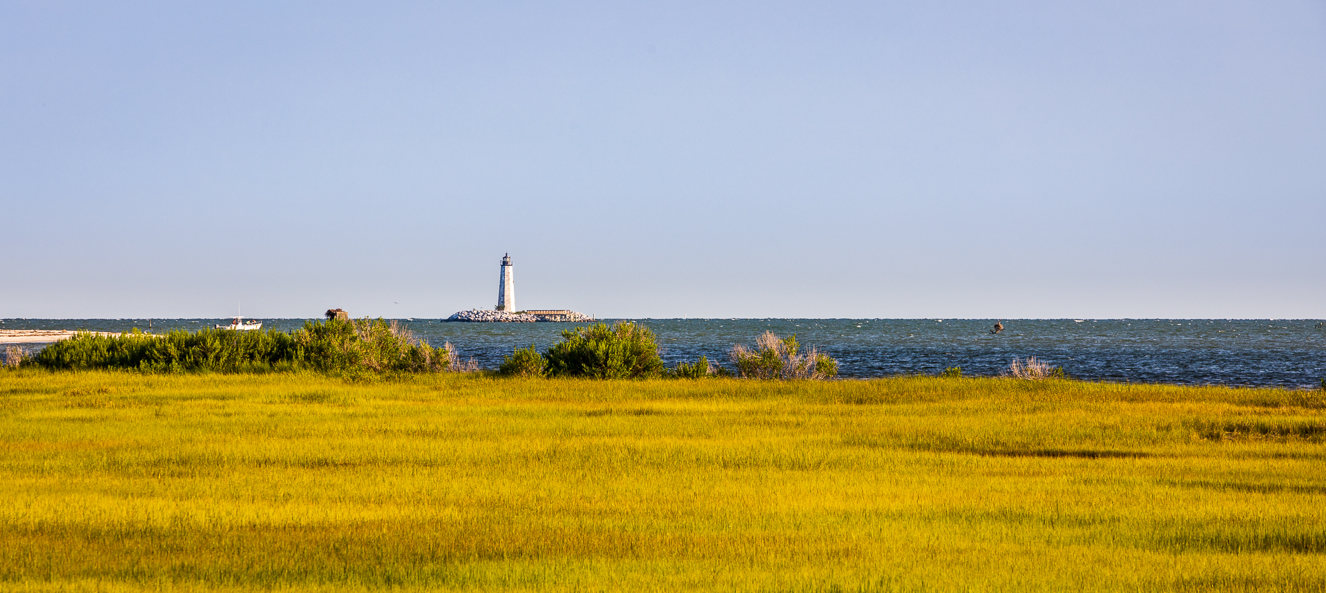 New Point Comfort Lighthouse on the Chesapeake Bay in Virginia Across a Salt Marsh
