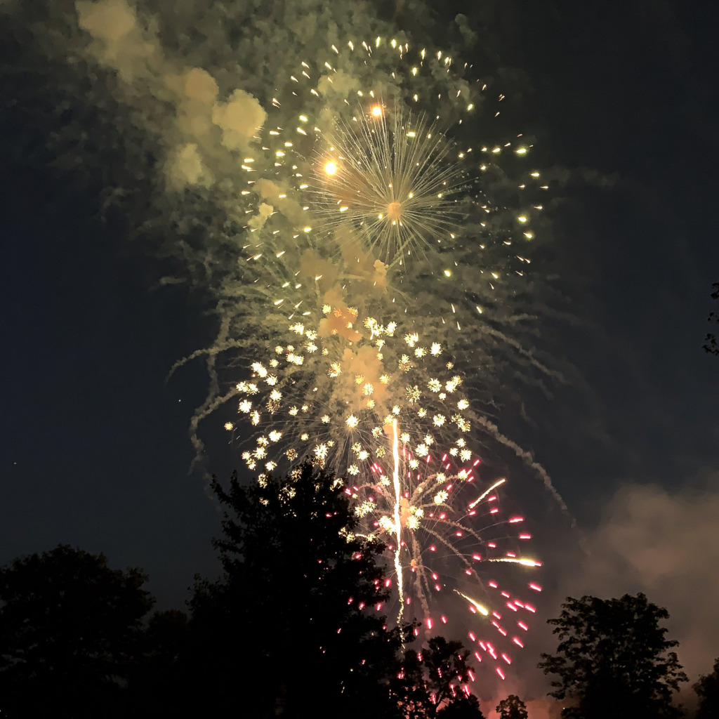 Fireworks stacked above one another in the sky