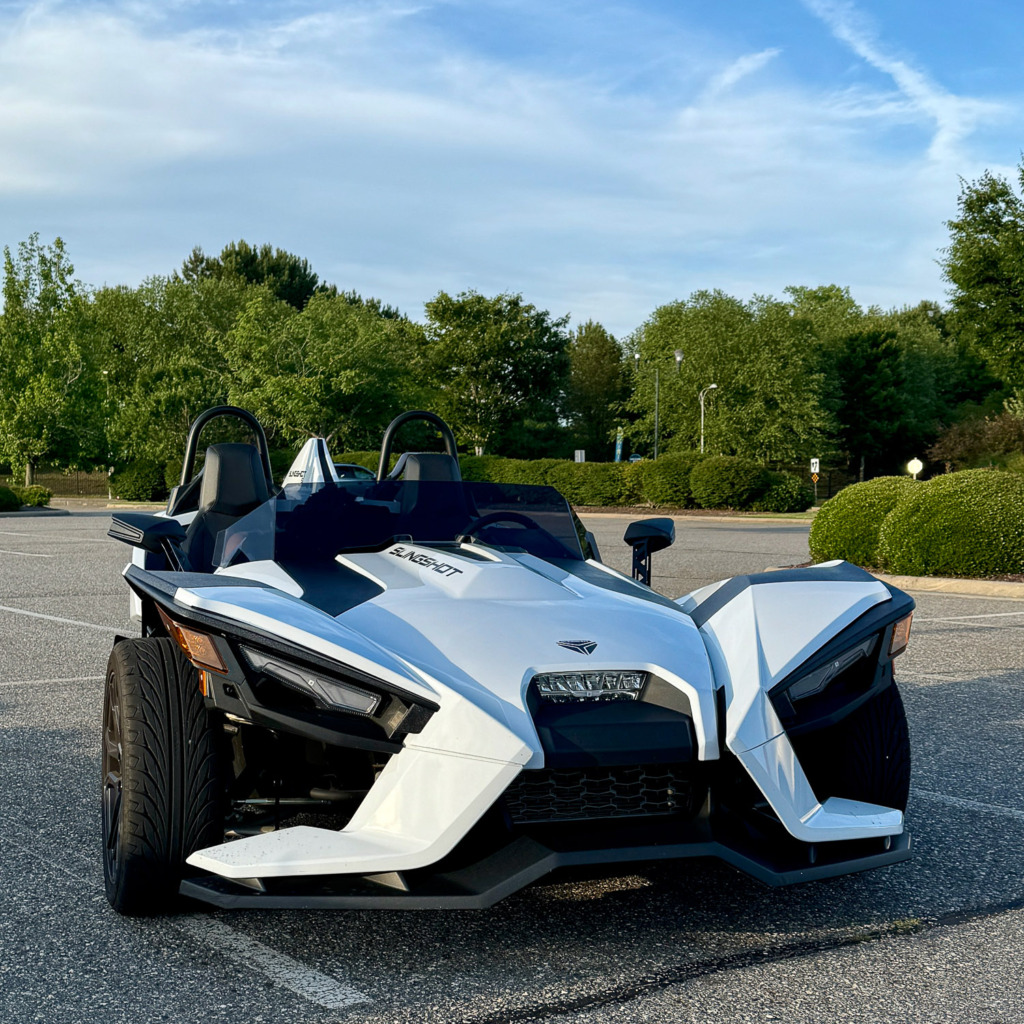 Photo of a Slingshot Car in a parking lot.
