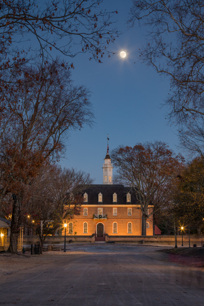 Manual Mode with a tripod allowed me to capture two photos and combine them to create this image of a full moon above the Capitol Building in Colonial Williamsburg, Virginia.