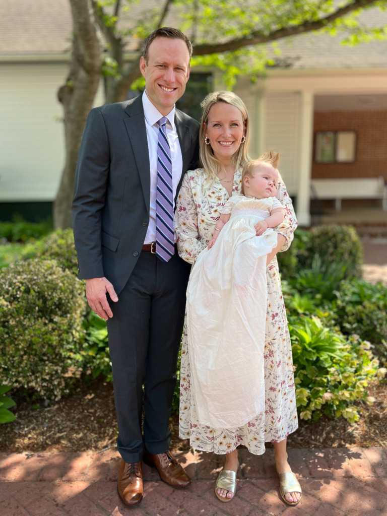 If you blur background on iPhone, you can capture a photo like this of a family after a christening with a blurred background.