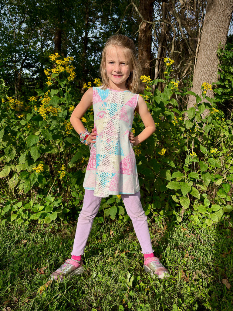 A composition trick made this young girl look taller and stronger.