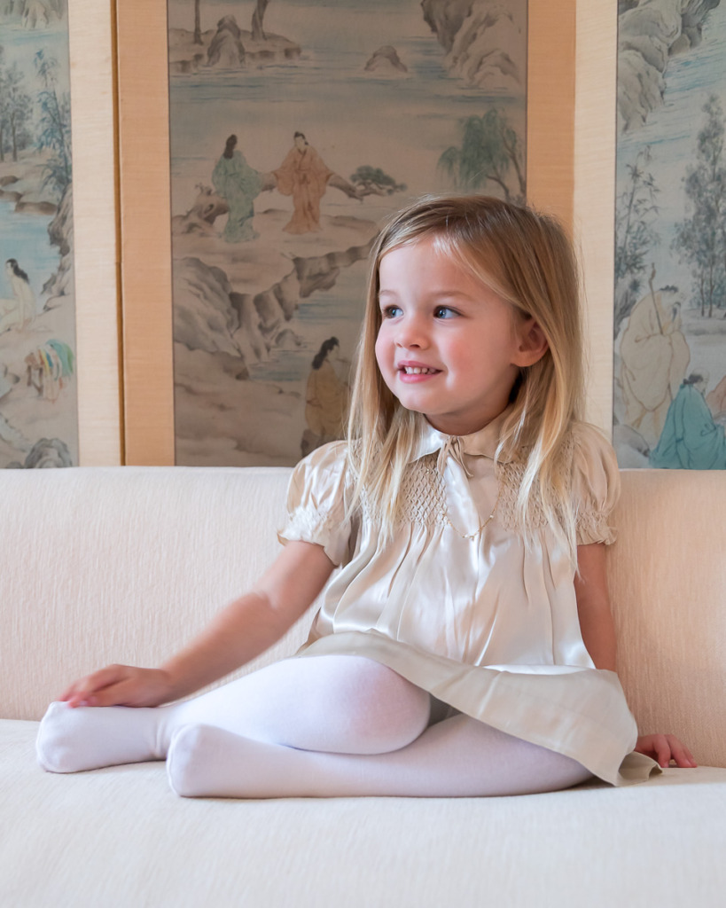 To take better photos indoors have the young girls look towards the window.